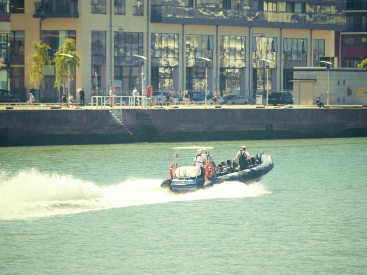 Sample listing photo of a speedboat on open water, shown for illustration only